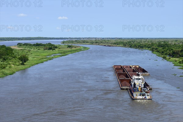 Pusher with iron ore cargo