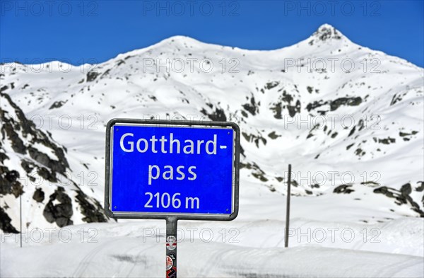 Sign with altitude indication on the pass summit elevation