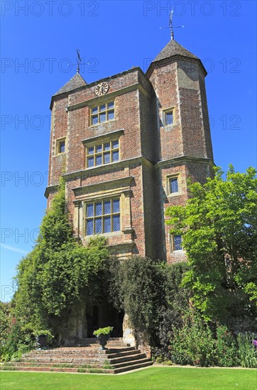 Red brick tower and blue sky