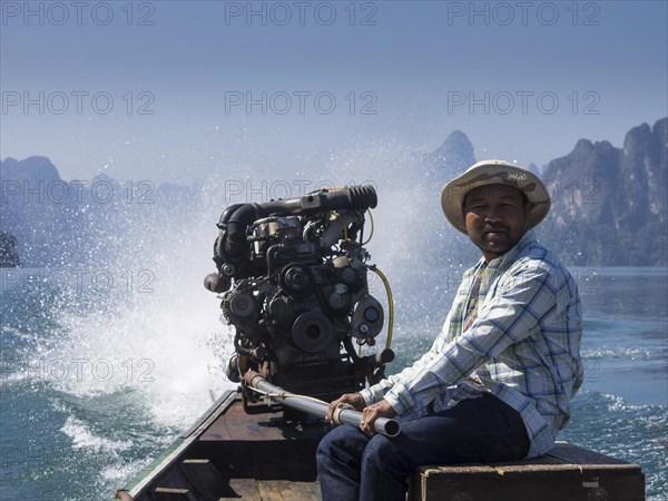 Man on powerboat