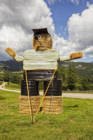 Large doll made of straw bales near Saint-Christophe