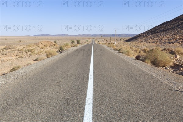 Straight road in a dry landscape