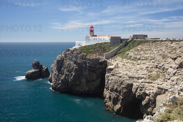 Lighthouse at steep coast