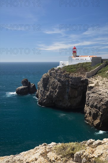 Lighthouse at steep coast