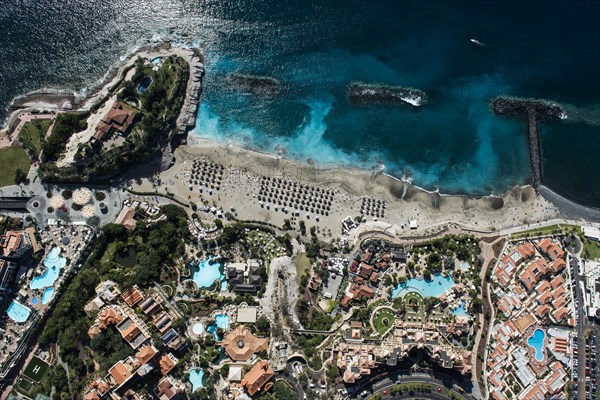 Seaside resort with beach and promenade by the sea