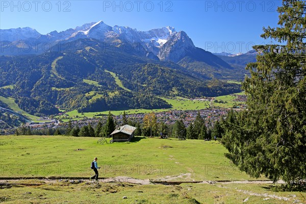 Eckenhutte am Wank with view on the village and the Wetterstein range with Alpspitze 2628m and Zugspitze 2962m