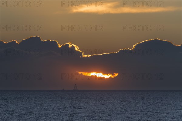 Sunset with dark clouds over the Baltic Sea