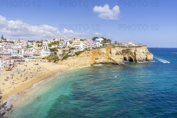 Sandy beach and white houses