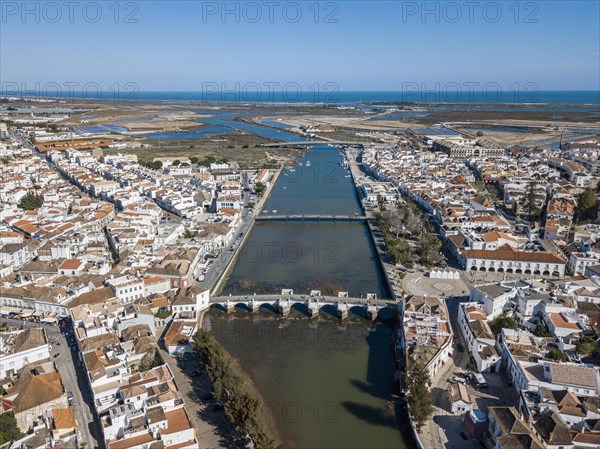 City view with roman bridge over Gilao river in old fishermen's town