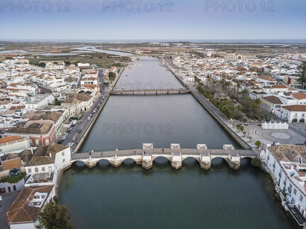 City view with roman bridge over Gilao river in old fishermen's town