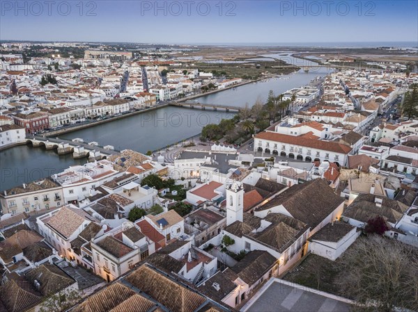 City view with roman bridge over Gilao river in old fishermen's town