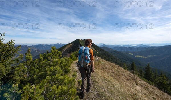 Hiker crossing the Blauberge