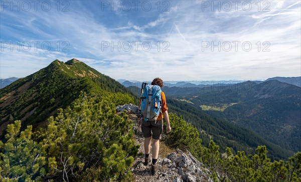 Hiker crossing the Blauberge