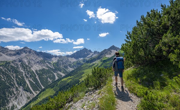 Hiker on hiking trail Jubilaumsweg