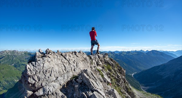 Hiker photographing