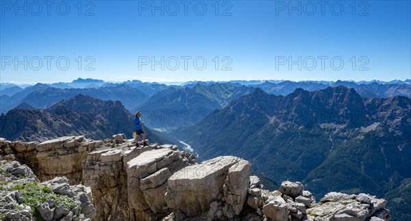 Hiker standing on rocks