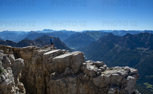 Hiker standing on rocks