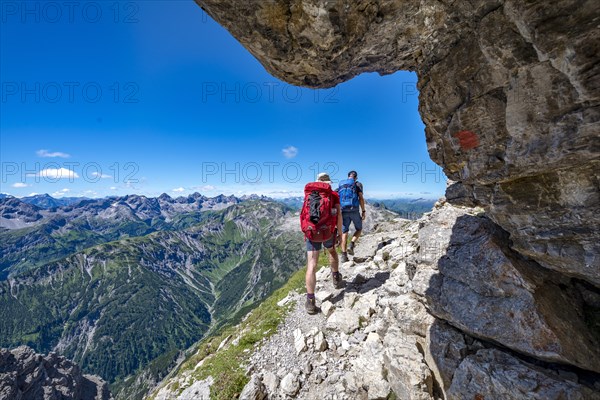 Two hikers on hiking trail