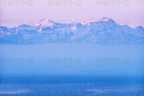 Lake with mountains Altmann and Santis in Switzerland