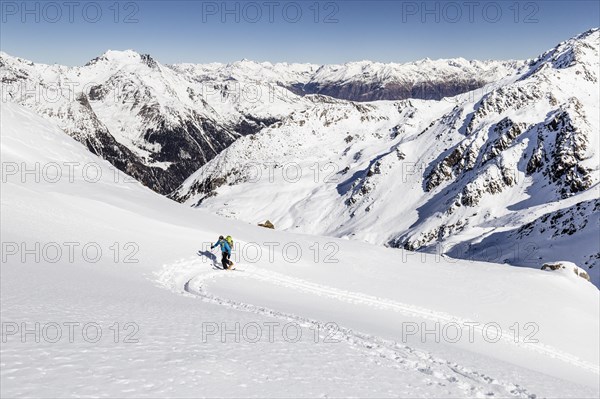 Ski tourer ascending Hintere Nonnenspitze