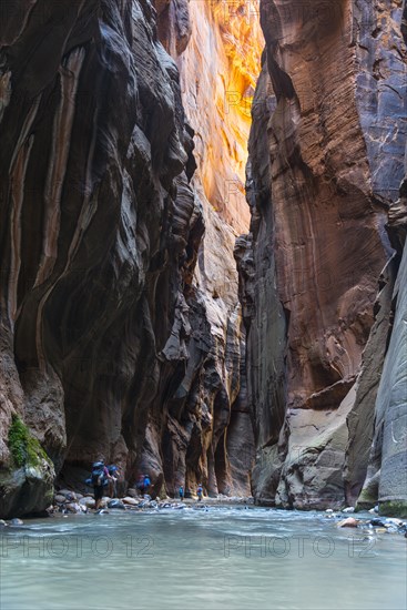 Hikers in river