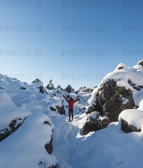 Woman with arms in the air