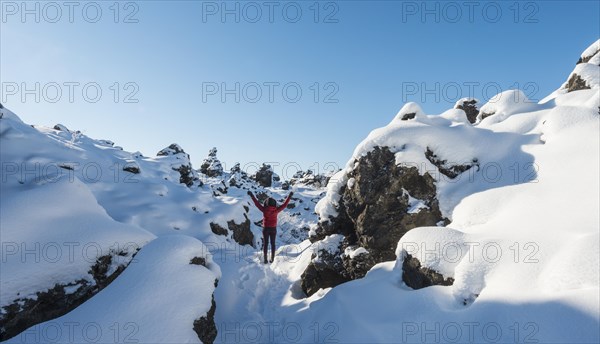 Woman with arms in the air