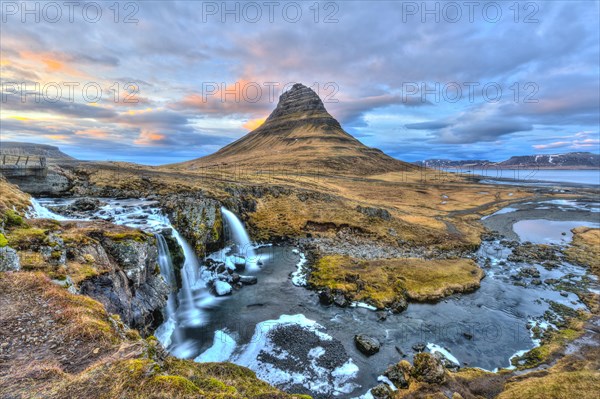 Mount Kirkjufell with Kirkjufellsfoss Waterfall