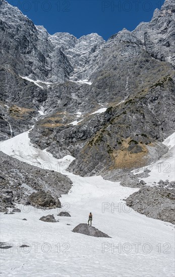 Hiker standing on rock