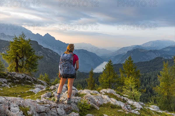 Hiker looks at mountain panorama