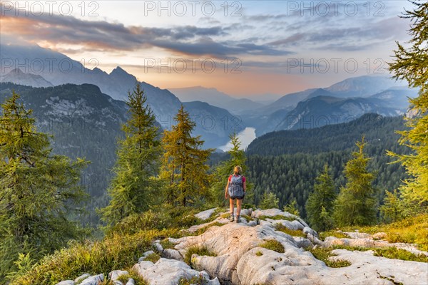 Hiker looks at mountain panorama