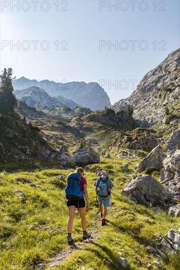Two hikers on one hiking trail