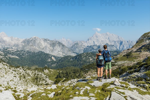 Two hikers looking at the Watzmann