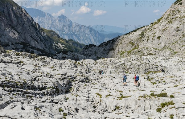 Hiker crosses rocks