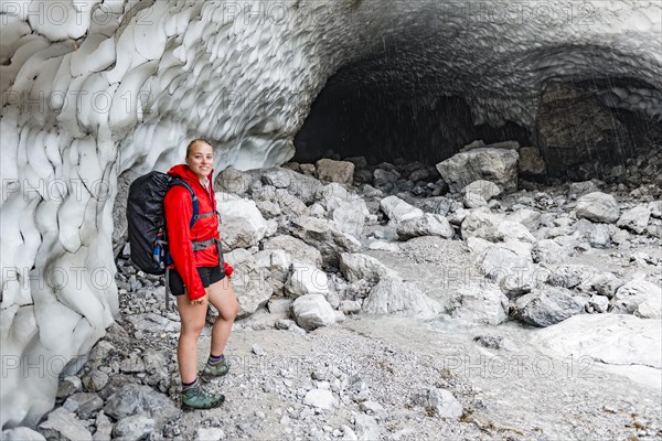 Female hiker in front of the ice chapel