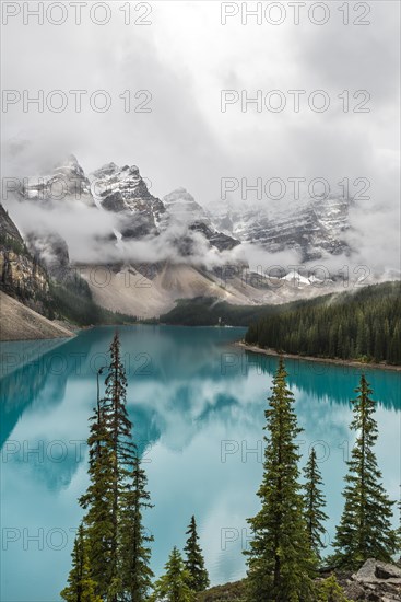 Clouds hanging between the mountain peaks