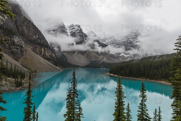 Clouds hanging between the mountain peaks