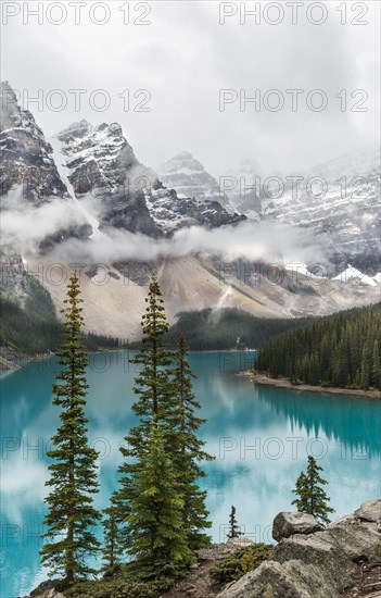 Clouds hanging between the mountain peaks