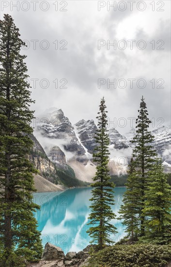 Clouds hanging between the mountain peaks