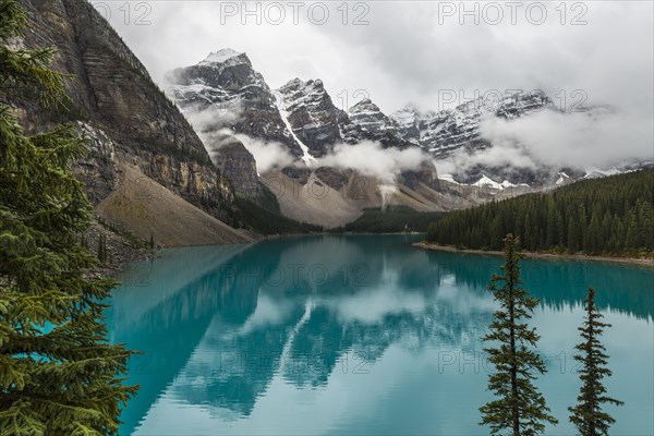 Clouds hanging between the mountain peaks