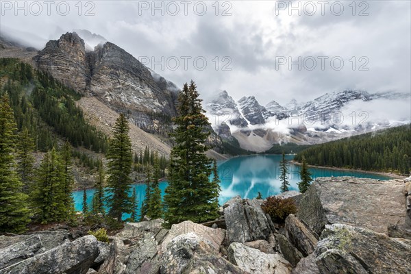 Clouds hanging between the mountain peaks