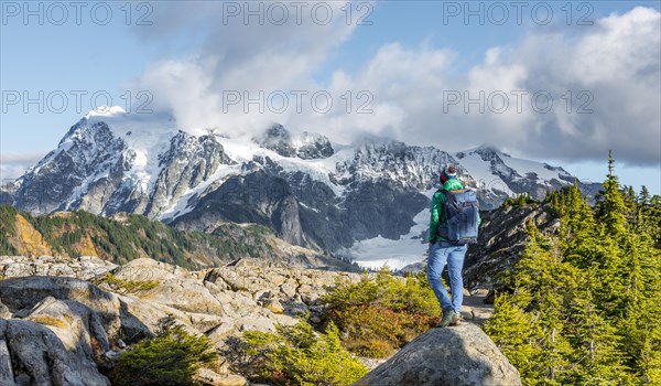 Female hiker looks into the distance