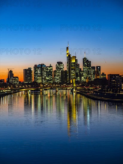 Deutschherrenbrucke with skyline at sunset