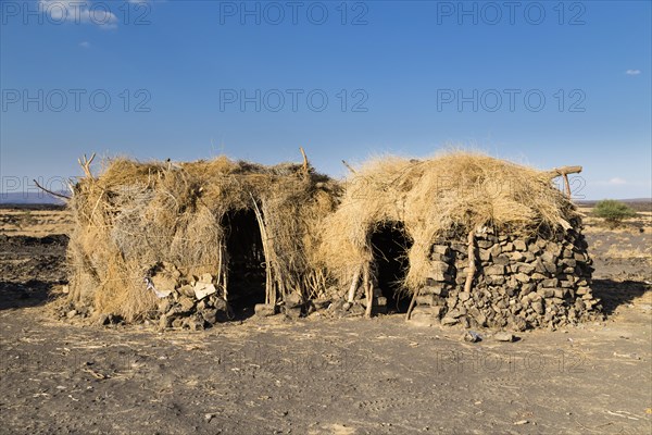 Huts in the Afar settlement at the foot of the active volcano Erta Ale