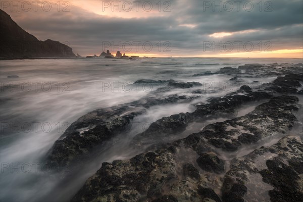 Rocky coast washed by the sea