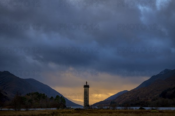 Loch Shiel with Glenfinnan Monument under threatening cloudy sky