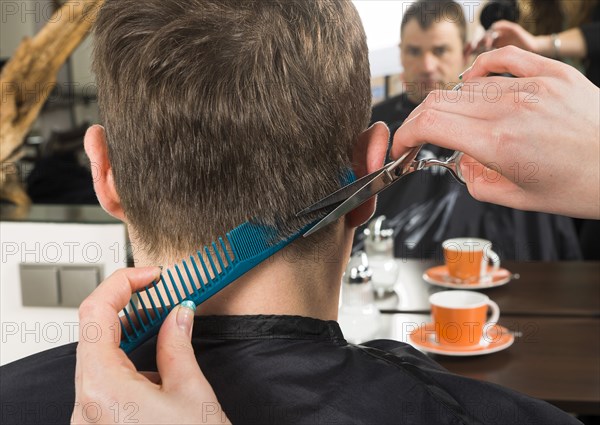 Man having haircut