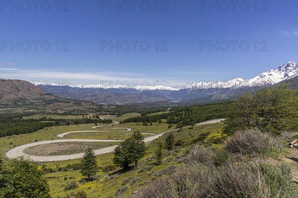 View of Carretera Austral with snow-covered mountain range