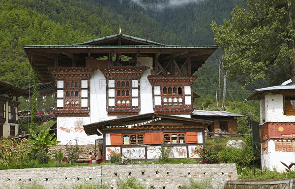 Traditional house painted with phallic symbol