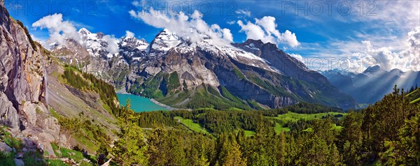 Oeschinen Lake with Bernese Alps with Bluemlisalp and mountain Doldenhorn